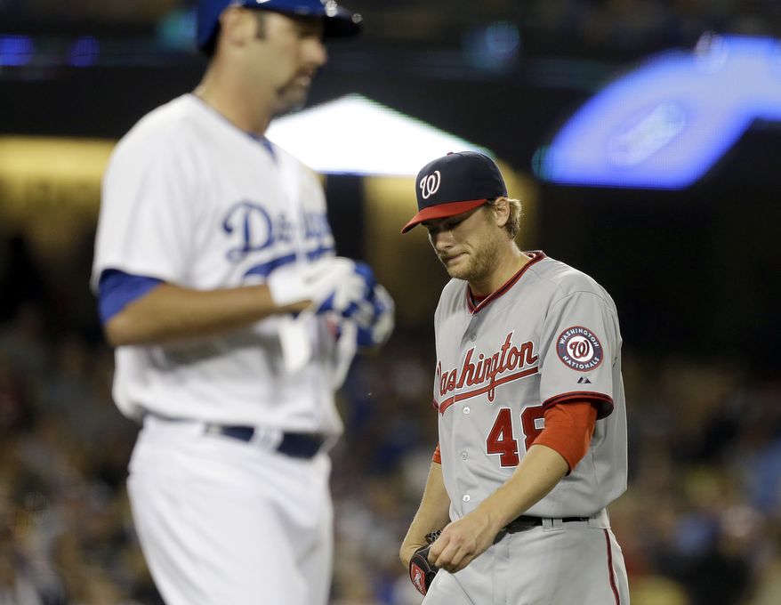 Nationals left-hander Ross Detwiler was pulled after three innings on Wednesday when the right side of his back began to spasm and lock up on him. (Associated Press photo)