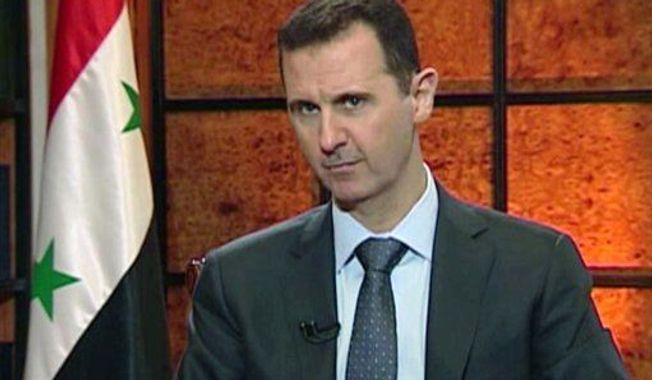 ** FILE ** Syrian President Bashar Assad speaks during an interview on Wednesday, April 17, 2013. (Associated Press/Syrian State TV via AP video)
