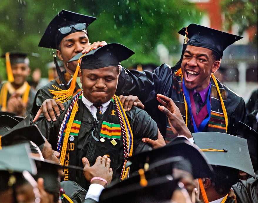 Graduating senior Leland Shelton is congratulated during Morehouse College 2013 commencement exercises.
(Associated Press)
