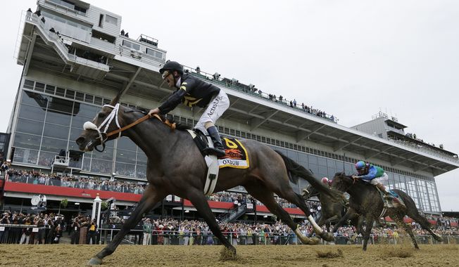 Oxbow, ridden by jockey Gary Stevens, wins the 138th Preakness Stakes horse race at Pimlico Race Course on Saturday, May 18, 2013, in Baltimore. (AP Photo/Matt Slocum)