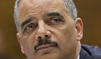**FILE** Attorney General Eric Holder, the nation&#x27;s top law enforcement official, testifies on Capitol Hill in Washington on May 15, 2013, before the House Judiciary Committee oversight hearing on the U.S. Department of Justice. (Associated Press)