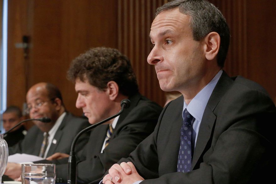** FILE ** Former IRS Commissioner Douglas H. Shulman (right) denies responsibility for a list that told specialists to “be on the lookout” for tea party groups. (Associated Press)