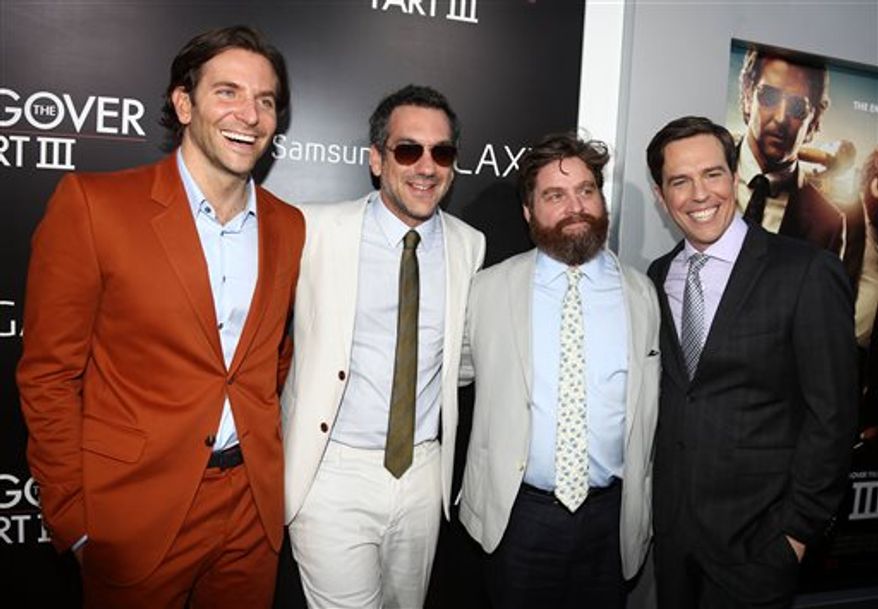 From left, Bradley Cooper, director Todd Phillips, Zach Galifianakis and Ed Helms pose together at the Los Angeles premiere of "The Hangover Part III." (Photo by Matt Sayles/Invision/AP)