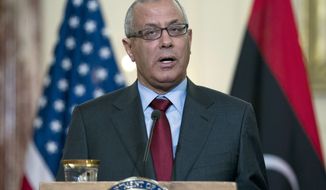**FILE** Libyan Prime Minister Ali Zidan speaks during a joint news conference with U.S. Secretary of State John Kerry at the State Department in Washington on March 13, 2013. (Associated Press)