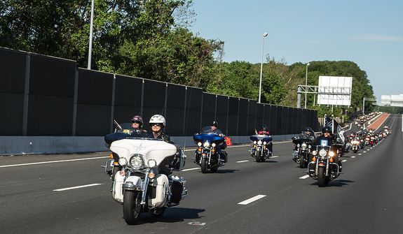Fairfax VA Chapter, Harley Owners Group, ride down Interstate 66 during the annual Ride of the Patriots, in support of Rolling Thunder, in Fairfax, VA., Sunday, May 26, 2013.  (Andrew S Geraci/The Washington Times)