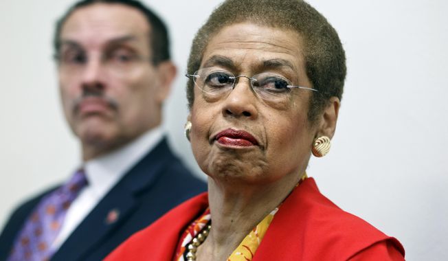 **FILE** Eleanor Holmes Norton (right), a non-voting delegate for the District of Columbia in the House of Representatives, and D.C. Mayor Vincent Gray, take part in a news conference on Capitol Hill in Washington on May 29, 2012. (Associated Press)