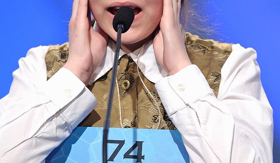 Mary Skirvin, 13, of Nashville, Ind., incorrectly spells &quot;laureation&quot; during the semifinal round of the Scripps National Spelling Bee in Oxon Hill, Md., Thursday, May 30, 2013. (AP Photo/Cliff Owen)