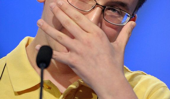 Mary Skirvin, 14, of Anderson, Ind., incorrectly spells &quot;ignimbrite&quot; during the semifinal round of the Scripps National Spelling Bee in Oxon Hill, Md., Thursday, May 30, 2013. (AP Photo/Cliff Owen)