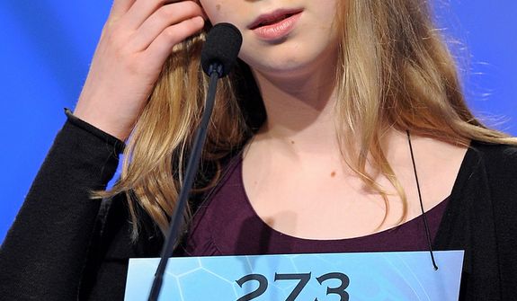 Sophia Limacher, 13, of Seattle, Wash, incorrectly spells &quot; morosoph&quot; during the semifinal round of the Scripps National Spelling Bee in Oxon Hill, Md., Thursday, May 30, 2013. (AP Photo/Cliff Owen)