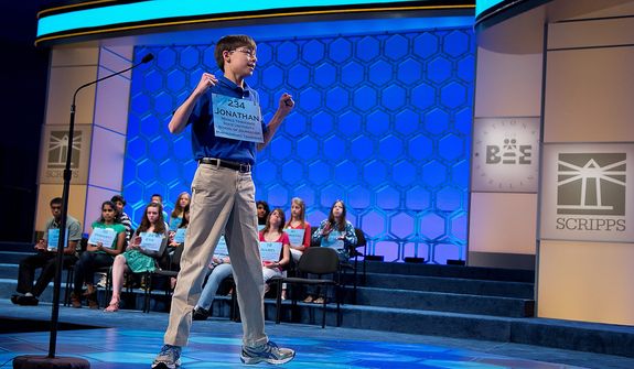 Jonathan Caldwell, 13, of Hendersonville, Tenn., reacts after spelling the word &quot;persiflage&quot; correctly during the semifinal round of the National Spelling Bee, Thursday, May 30, 2013, in Oxon Hill, Md. (AP Photo/Evan Vucci)
