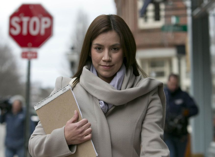 ** FILE ** In this March 13, 2013, file photo, Alexis Wright, 30, leaves the Cumberland County Courthouse in Portland, Maine. (AP Photo/Robert F. Bukaty, File)