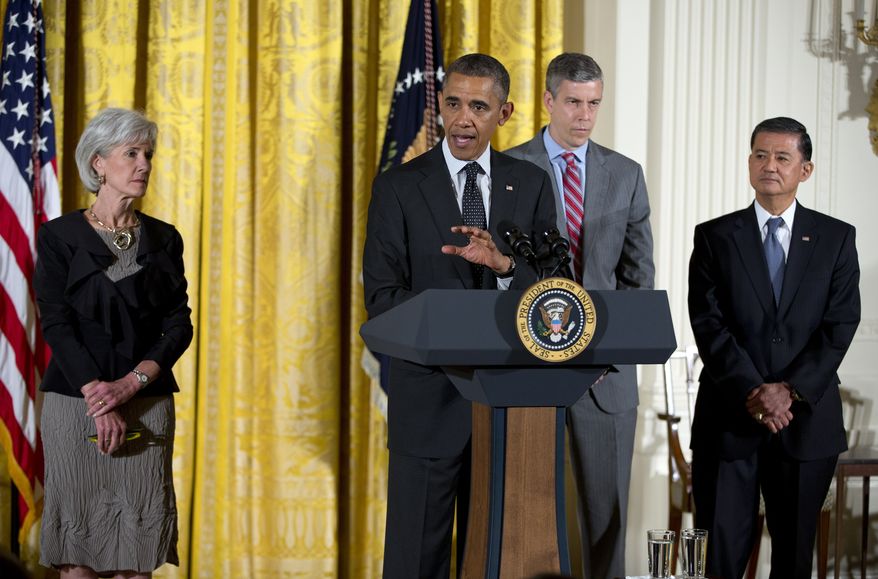 President Obama, accompanied by (from left) Health and Human Services Secretary Kathleen Sebelius, Education Secretary Arne Duncan and Veterans Affairs Secretary Eric Shinseki. speaks during the White House mental health conference on June 3, 2013, in the East Room of the White House. The conference was organized as part of President Obama's response to last year's shooting massacre at a Connecticut elementary school. (Associated Press)
