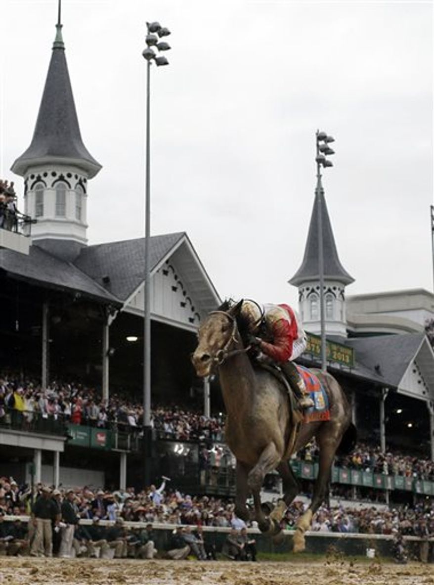 In this May 4, 2013, file photo, Orb, ridden by jockey Joel Rosario, crosses the finish line to win the 139th Kentucky Derby horse race at Churchill Downs in Louisville, Ky. Even without a horse going for racing immortality with a Triple Crown, there's plenty of history in the making at next Saturday's Belmont Stakes, starting with a rematch between Derby winner Orb and Preakness winner Oxbow. (AP Photo/David J. Phillip, File)