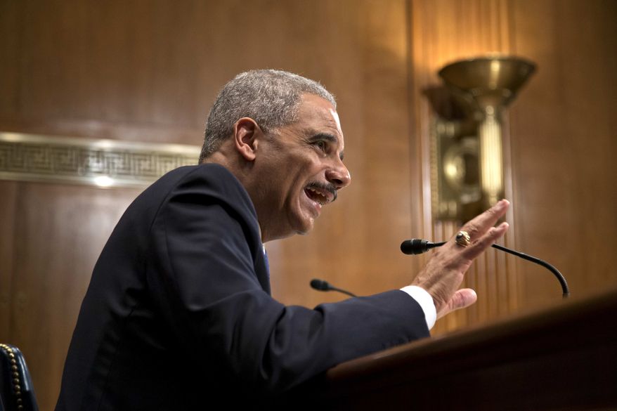 Attorney General Eric Holder testifies on Capitol Hill in Washington, Thursday, June 6, 2013, before a Senate Appropriations subcommittee as lawmakers examine the budget for the Justice Department. (AP Photo/J. Scott Applewhite)