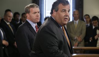 New Jersey Attorney General Jeffrey Chiesa (left), 47, listens June 6, 2013, in Trenton, N.J., as Gov. Chris Christie announces that Chiesa will temporarily fill the U.S. Senate seat that opened up this week after Frank Lautenberg&#39;s death. (Associated Press)