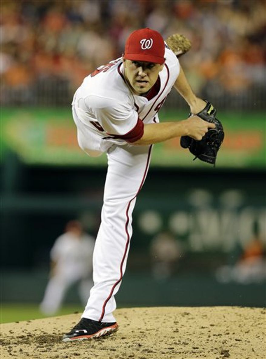 Washington Nationals starting pitcher Nathan Karns throws during an interleague baseball game against the Baltimore Orioles at Nationals Park Tuesday, May 28, 2013, in Washington. (AP Photo/Alex Brandon)
