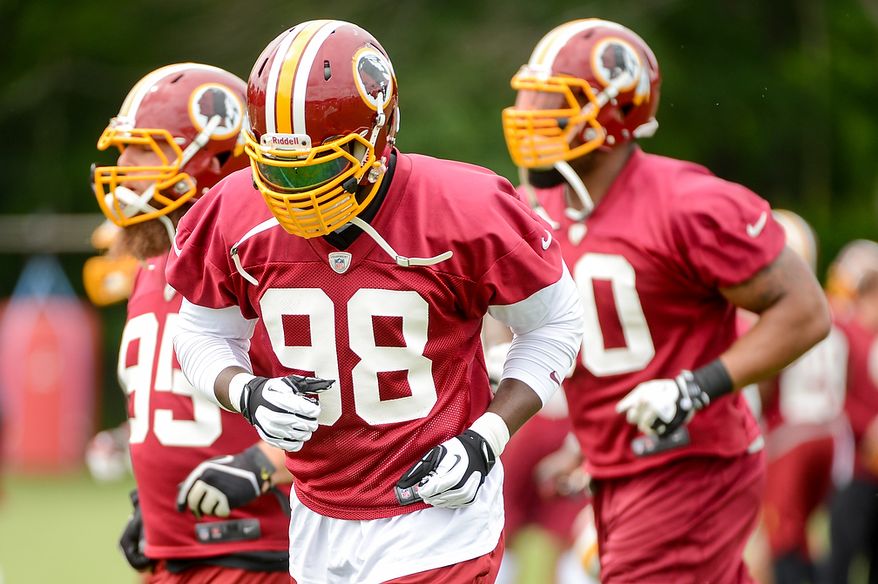 Washington Redskins outside linebacker Brian Orakpo jogs during a NFL football organized team activity at Redskins Park, Ashburn, Va., Thursday, June 6, 2013. (Andrew Harnik/The Washington Times)
