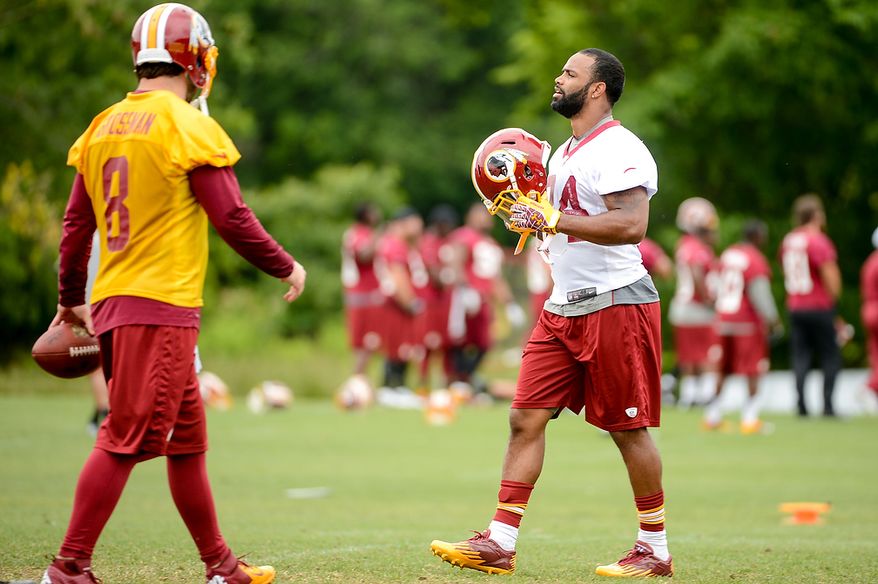 Washington Redskins tight end Niles Paul (84), right, during a NFL football organized team activity at Redskins Park, Ashburn, Va., Thursday, June 6, 2013. (Andrew Harnik/The Washington Times)