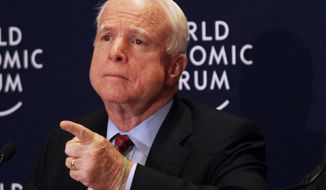 **FILE** Sen. John McCain, Arizona Republican, speaks May 25, 2013, at a news conference at the World Economic Forum, in Southern Shuneh, southeast of Amman, Jordan. (Associated Press)