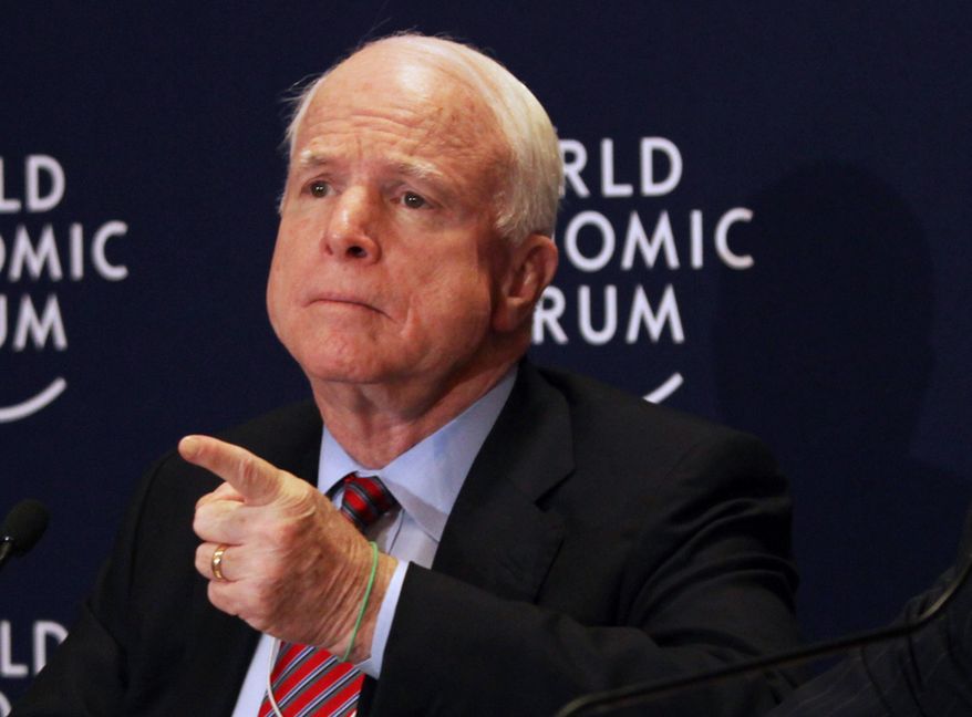 **FILE** Sen. John McCain, Arizona Republican, speaks May 25, 2013, at a news conference at the World Economic Forum, in Southern Shuneh, southeast of Amman, Jordan. (Associated Press)