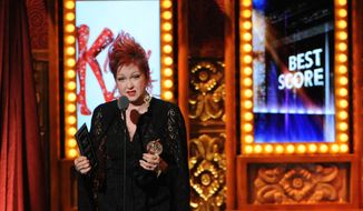 Cyndi Lauper accepts the Tony Award for best score for her work on the music and lyrics for &quot;Kinky Boots,&quot; at the 67th annual Tony Awards on Sunday, June 9, 2013, in New York. (Evan Agostini/Invision/AP)