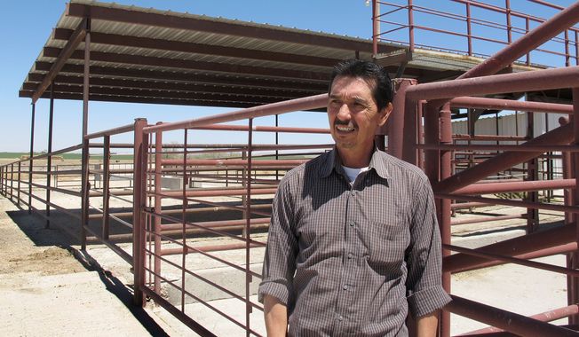 **FILE** Valley Meat Co. owner Rick De Los Santos stands April 15, 2013, in a corral area outside the former cattle slaughterhouse he has converted to a horse slaughter facility in Roswell, N.M. The plant — which has been waiting more than a year for federal approval of its operations — has become ground zero for an emotional, national debate over a return to domestic horse slaughter. (Associated Press)