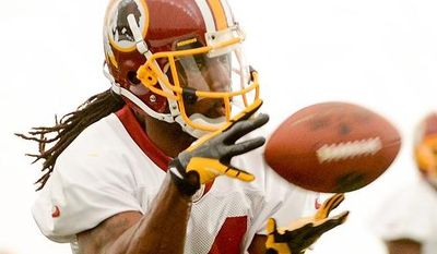 Wide receiver Donte Stallworth makes a catch while trying out for the Washington Redskins during mini camp at Redskins Park, Ashburn, Md., Tuesday, June 11, 2013. (Andrew Harnik/The Washington Times)