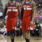 **FILE** Washington Wizards guards John Wall (2) and guard Bradley Beal (3) in the first half of an NBA basketball game against the Detroit Pistons Wednesday, Feb. 13, 2013, in Auburn Hills, Mich. (AP Photo/Duane Burleson)