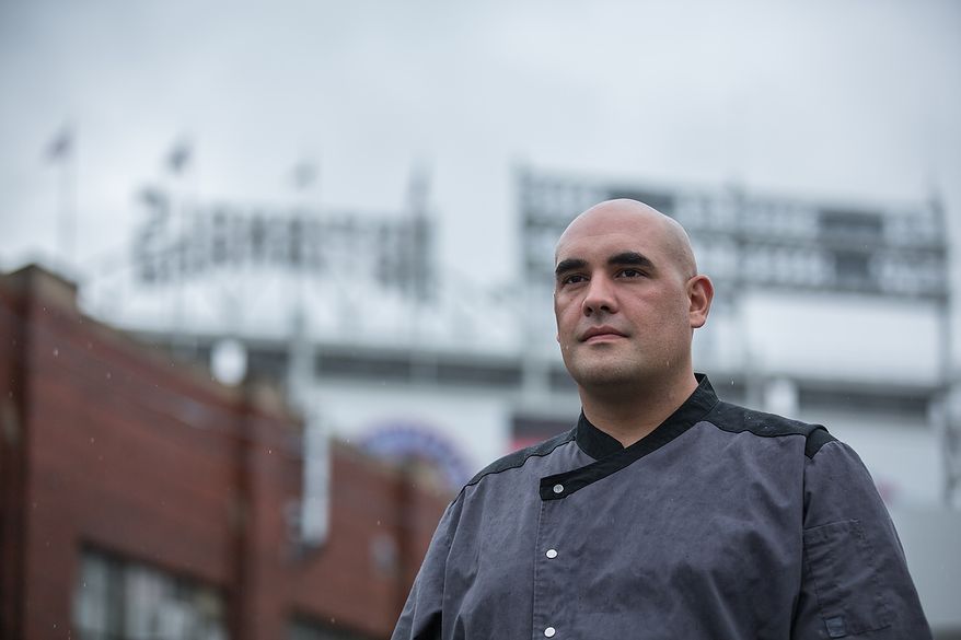 Faisal Sultani, Executive Chef & Owner of Clubhouse Cuisine, poses for a photograph outside of Nationals Ball Park in Washington, DC., Friday June 7, 2013. (Andrew S Geraci/The Washington Times)