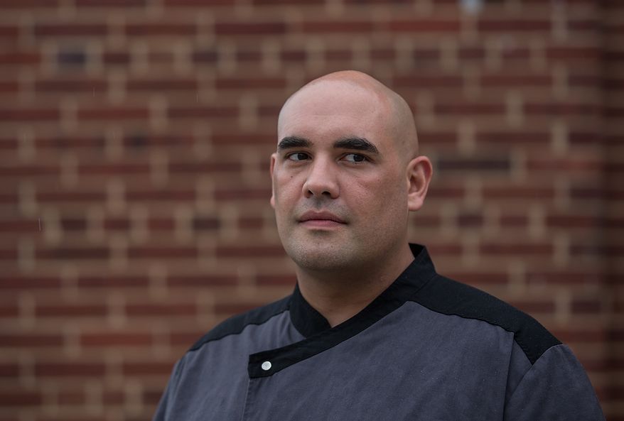Faisal Sultani, Executive Chef & Owner of Clubhouse Cuisine, poses for a photograph outside of Nationals Ball Park in Washington, DC., Friday June 7, 2013. (Andrew S Geraci/The Washington Times)