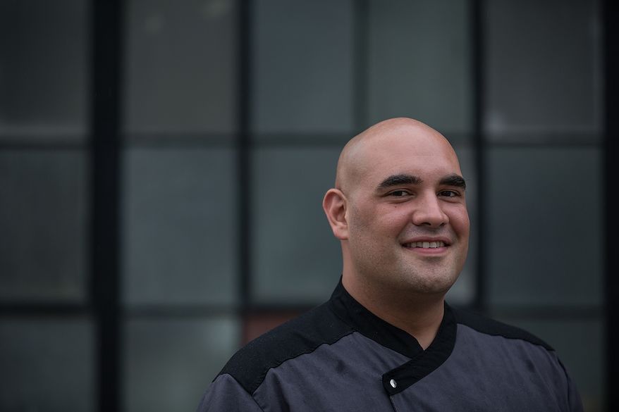 Faisal Sultani, Executive Chef & Owner of Clubhouse Cuisine, poses for a photograph outside of Nationals Ball Park in Washington, DC., Friday June 7, 2013. (Andrew S Geraci/The Washington Times)
