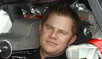 FILE - In this July 6, 2007 file photo, NASCAR Busch series driver Jason Leffler sits in his car before his qualifying run at the Daytona International Speedway in Daytona Beach, Fla. Leffler died after an accident in a heat race at a dirt car event at Bridgeport Speedway in Swedesboro, N.J., Wednesday night, June 12, 2013, New Jersey State Police said. (AP Photo/Glenn Smith, File)