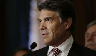 ** FILE ** Texas Gov. Rick Perry speaks during a ceremonial signing of a water fund bill on Tuesday, May 28, 2013, in Austin, Texas. (AP Photo/Eric Gay)