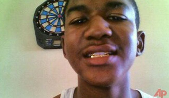 ** FILE ** Trayvon Martin, a Florida teen who was shot and killed in February 2012 while unarmed, is pictured in an undated photo. (Associated Press)