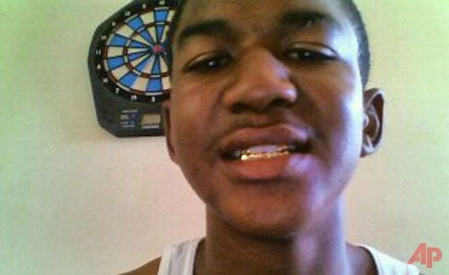 ** FILE ** Trayvon Martin, a Florida teen who was shot and killed in February 2012 while unarmed, is pictured in an undated photo. (Associated Press)