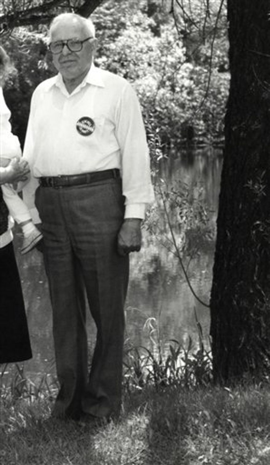 In this May 22, 1990 photo, Michael Karkoc, photographed in Lauderdale, Minn. prior to a visit to Minnesota from Soviet President Mikhail Gorbachev in early June of 1990. Karkoc a top commander whose Nazi SS-led unit is blamed for burning villages filled with women and children lied to American immigration officials to get into the United States and has been living in Minnesota since shortly after World War II, according to evidence uncovered by The Associated Press. (AP Photo/The St. Paul Pioneer Press, Chris Polydoroff)