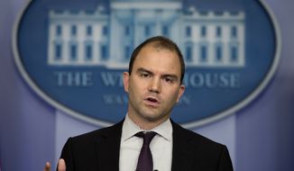 ** FILE ** Deputy National Security Adviser Ben Rhodes gestures as he speaks during the daily press briefing at the White House in Washington on Friday, June 14, 2013, in Washington. (AP Photo/Evan Vucci)

