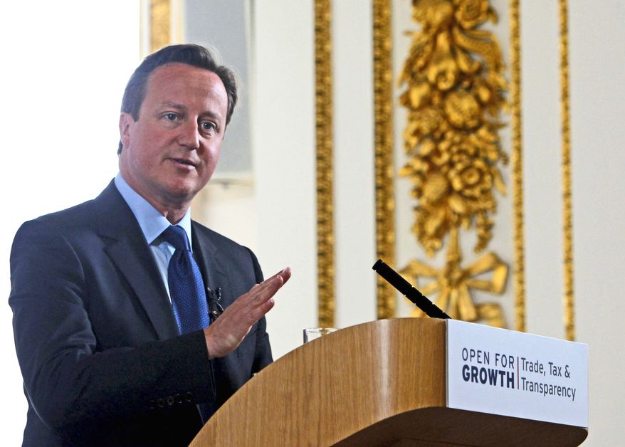 "Trade is key to economic growth and job creation," British Prime Minister David Cameron says of the focus of this year's Group of Eight summit. Tax compliance and transparency issues also will discussed during the meetings in Northern Ireland.
(Associated Press)