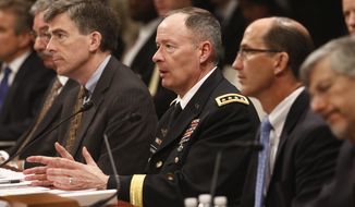 From left: Deputy Attorney General James Cole; Chris Inglis, deputy director of the National Security Agency; Gen. Keith B. Alexander, director of the National Security Agency; Sean Joyce, Deputy Director of the FBI; and Robert Litt, general counsel to the Office of the Director of National Intelligence, testify before the House Permanent Select Committee on Intelligence in Washington on June 18, 2013, regarding NSA surveillance. (Associated Press)