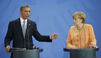 U.S. President Barack Obama and German Chancellor Angela Merkel meet during their joint news conference at the Chancellery in Berlin, Germany, Wednesday, June 19, 2013. Obama will renew his call to reduce the world&#39;s nuclear stockpiles, including a proposed one-third reduction in U.S. and Russian arsenals, a senior administration official said. (AP Photo/Pablo Martinez Monsivais)


