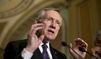 Senate Majority Leader Harry Reid, Nevada Democrat, speaks with reporters following a Democratic strategy session at the Capitol in Washington on Tuesday, June 18, 2013. (Associated Press)
