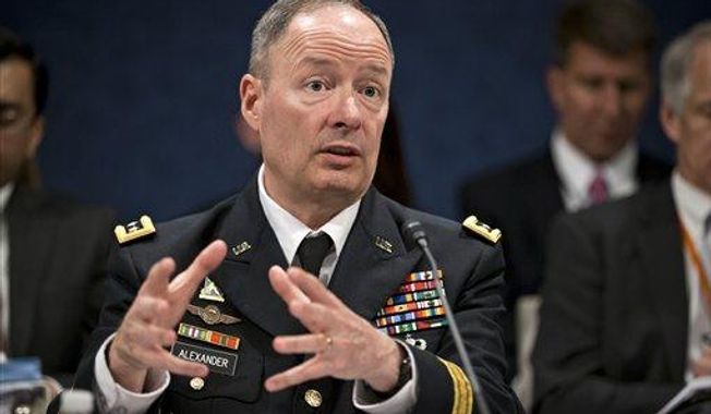 **FILE** Gen. Keith B. Alexander, director of the National Security Agency and head of the U.S. Cyber Command, testifies before the House Permanent Select Committee on Intelligence on Capitol Hill in Washington on June 18, 2013. (Associated Press)