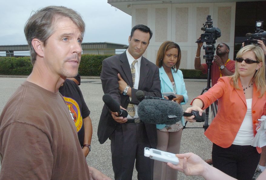 **FILE** Chris Simcox, the president of the Minuteman Civil Defense Corps, addresses the media at West Houston Airport on Aug. 14, 2005, regarding the issue of border patrols and their training and tactics. (Associated Press)