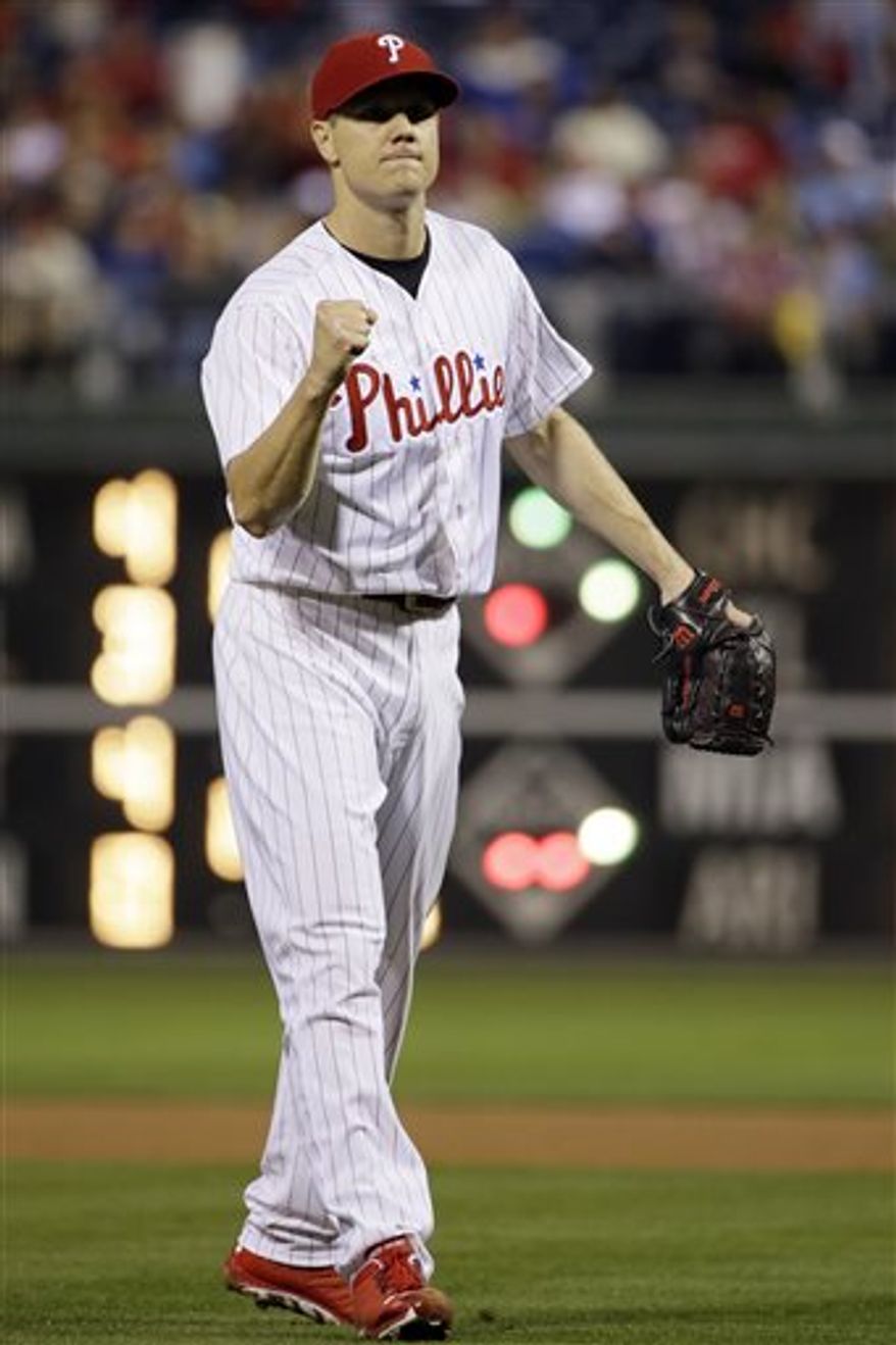 Philadelphia Phillies relief pitcher Jonathan Papelbon reacts after Washington Nationals' Ian Desmond hit into a fielder's choice to end a baseball game, Tuesday, June 18, 2013, in Philadelphia. Philadelphia won 4-2. (AP Photo/Matt Slocum)