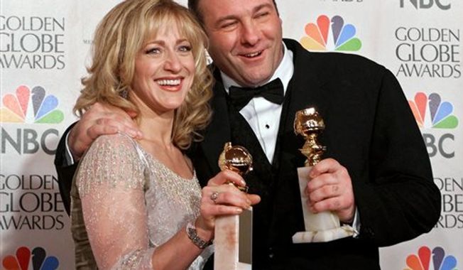 ** FILE ** Edie Falco, left, and James Gandolfini with their awards for best performance by an actress and actor in a dramatic televison series for &quot;The Sopranos,&quot; during the 57th Golden Globe Awards in Beverly Hills, Calif., July 23, 2000. (Associated Press)