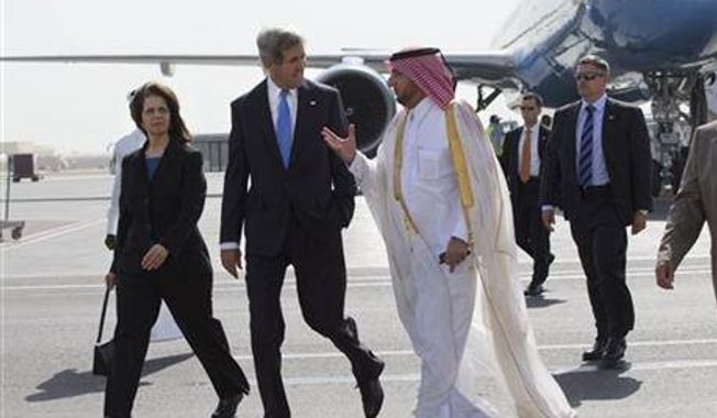 U.S. Ambassador to Qatar Susan Ziadeh, left, walks with U.S. Secretary of State John Kerry, second from left, and Ambassador Ibrahim Fakhroo, Qatari Chief of Protocol, on Kerry&#x27;s arrival in Doha, Qatar, on Saturday, June 22, 2013. (Associated Press)