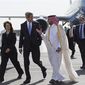 U.S. Ambassador to Qatar Susan Ziadeh, left, walks with U.S. Secretary of State John Kerry, second from left, and Ambassador Ibrahim Fakhroo, Qatari Chief of Protocol, on Kerry&#39;s arrival in Doha, Qatar, on Saturday, June 22, 2013. (Associated Press)