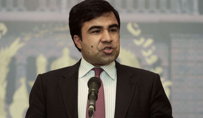 Foreign Ministry spokesman Janan Mosazai speaks during a press conference in Kabul, Afghanistan, Sunday, June 23, 2013. Mosazai said the Afghan government remains willing to send a peace delegation to Doha to negotiate with the Taliban once it has its explanation of how the Taliban were allowed to open an office in Qatar that was akin to an embassy. (AP Photo/Rahmat Gul)