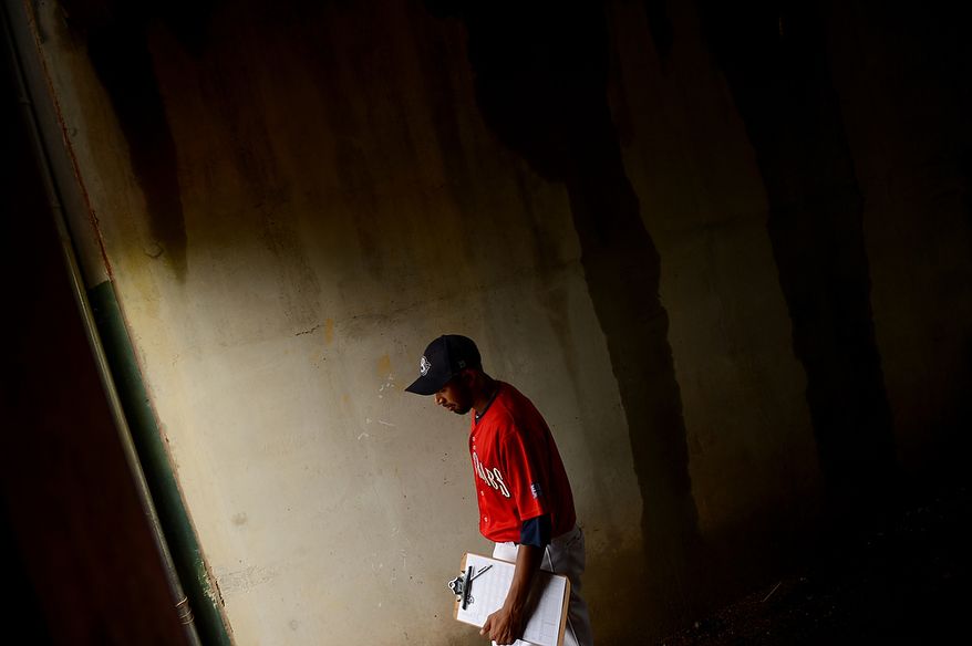 Blue Crabs pitcher Daryl Thompson (3) steps out onto the field before the independent baseball league's Blue Crabs play the Camden RiverSharks at Regency Furniture Stadium, Waldorf, Md., Sunday, June 23, 2013. (Andrew Harnik/The Washington Times)