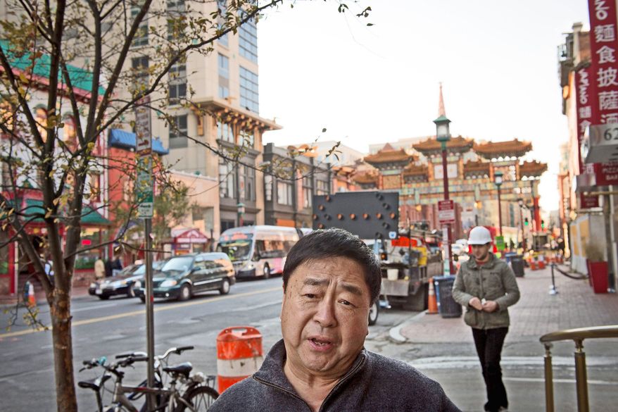 Tony Cheng, president of Tony Cheng's restaurant in Chinatown, and his son were indicted Tuesday on charges of passing a bribe to the head of the D.C. Taxicab Commission in a scheme to circumvent the city's moratorium on new cab companies.